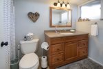 En suite master bath with shower tub combination